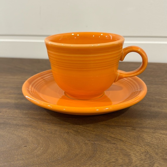 Tangerine Fiestaware teacup and saucer - Picture 1 of 6